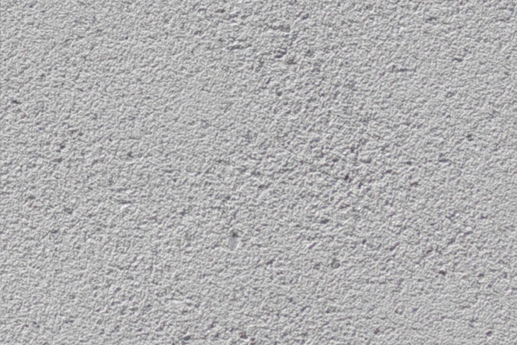 Fassadendetail des verwendeten weißen, gestrahlten Sichtbetonelement Avaloq in Zürich