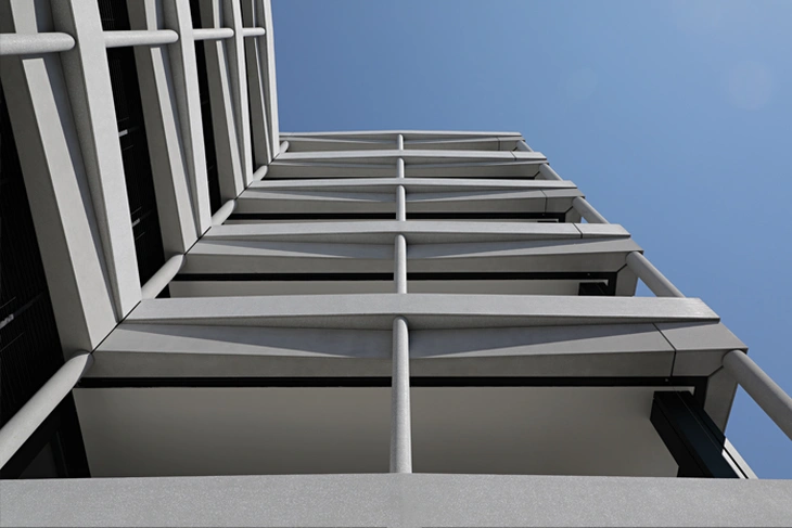 weiße Architekturbetonfassade Atmos Zürich